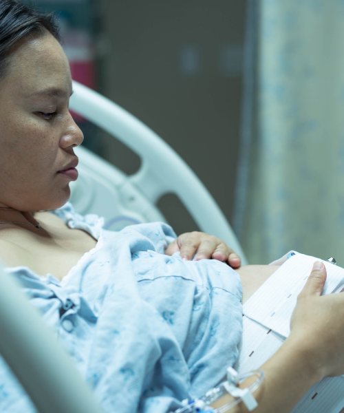 Female patient consulting doctor for medical termination of pregnancy